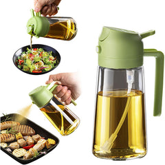 Green oil dispenser pouring oil onto a salad and grilled food on a white background