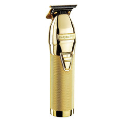 Gold hair clipper on a white background