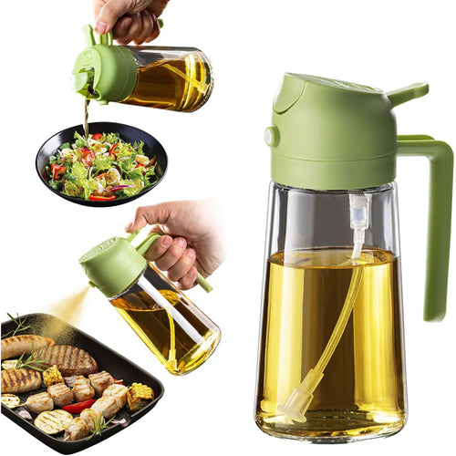 Green oil dispenser pouring oil onto a salad and grilled food on a white background